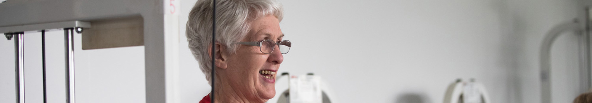 Woman on gym equipment